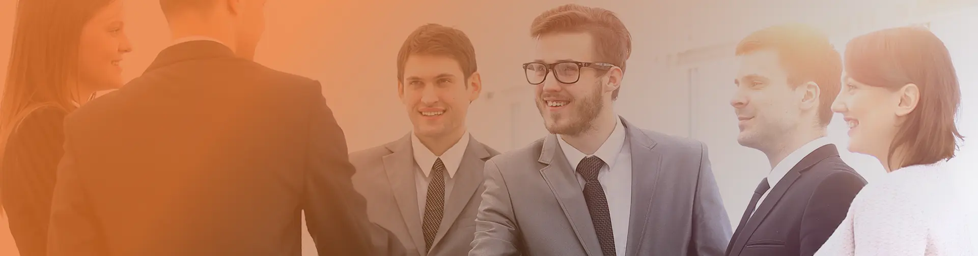 Group of financial professionals networking and discussing business opportunities